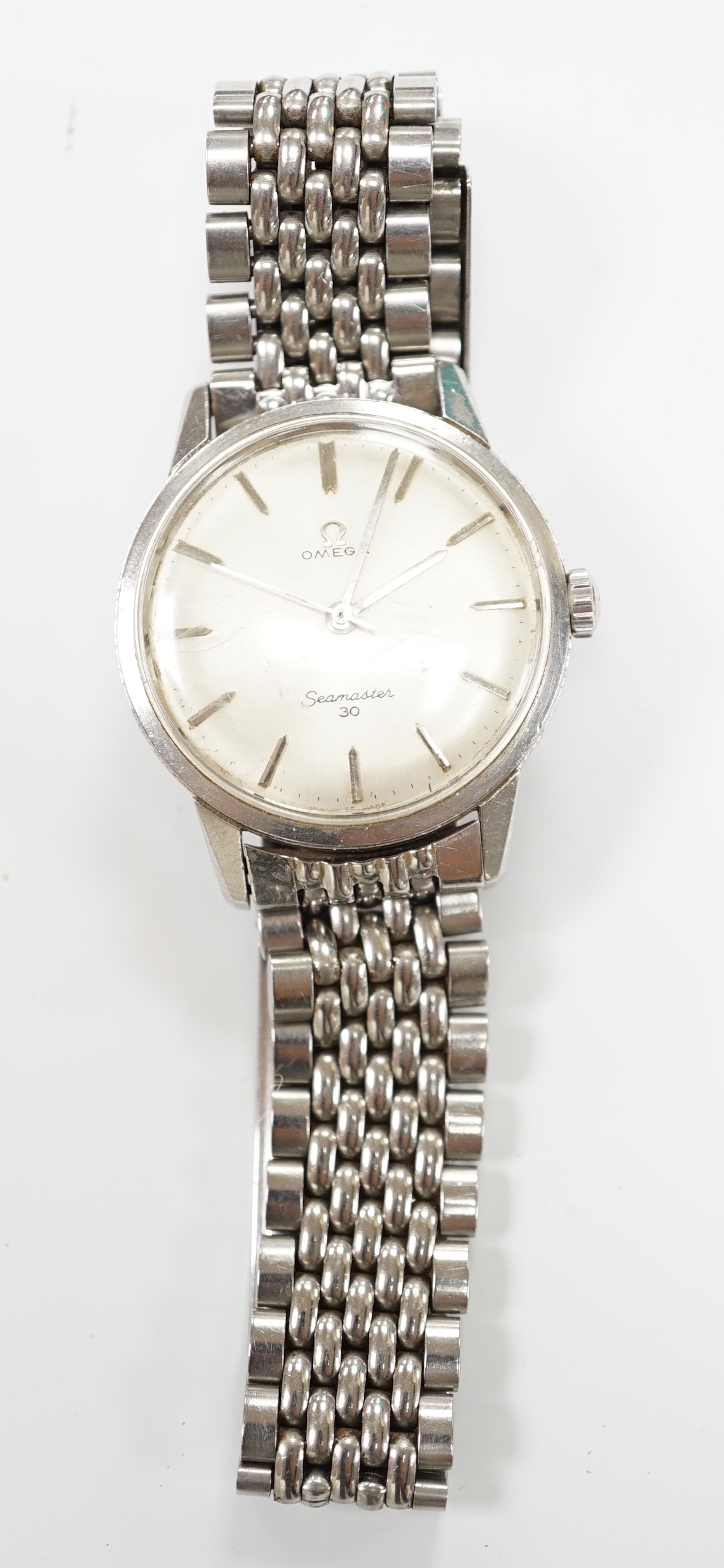 A gentleman's stainless steel Omega Seamaster 30 manual wind wrist watch, on a stainless steel Omega bracelet, case diameter 35mm, no box or papers.